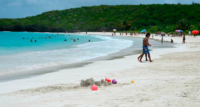 People play on a beach in Puerto Rico.