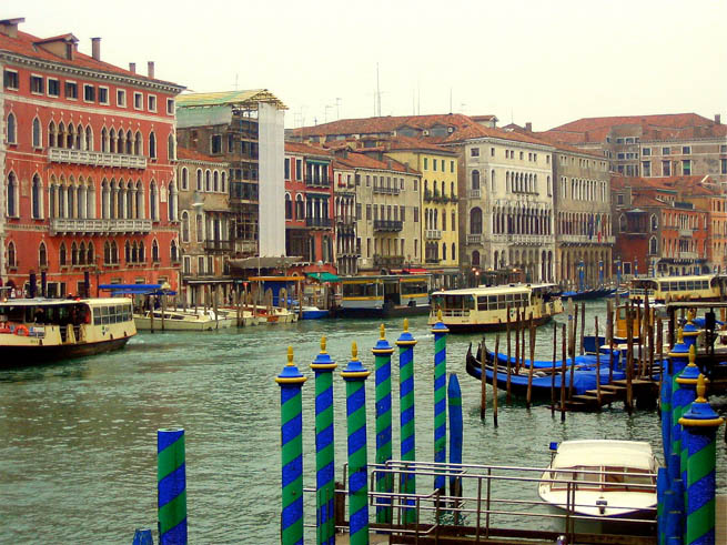 Venice is a city in northeastern Italy sited on a group of 118 small islands separated by canals and linked by bridges