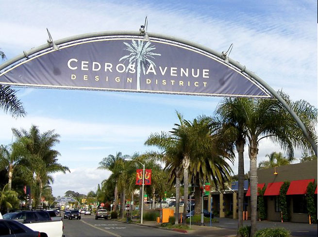 A banner stretches across a street, welcoming visitors to Cedros Avenue in San Diego. San Diego, California, has many activities to offer travelers.