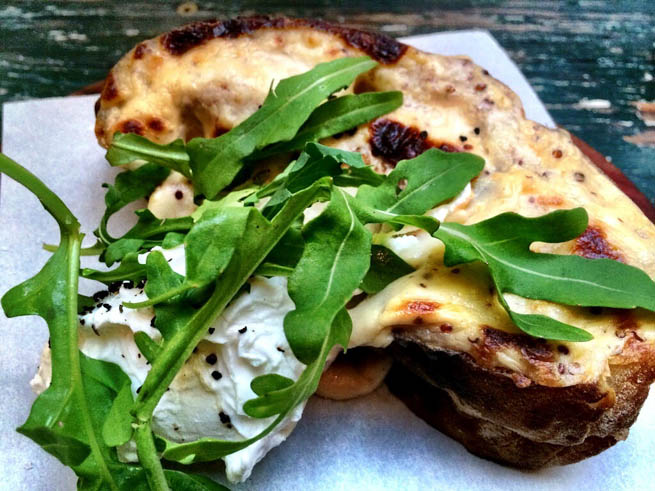 A croque-monsieur is a grilled ham and cheese sandwich