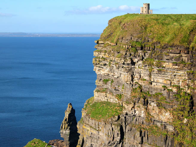 Cliffs of Moher are located at the southwestern edge of the Burren region in County Clare, Ireland Cliffs of Moher are located at the southwestern edge of the Burren region in County Clare, Ireland