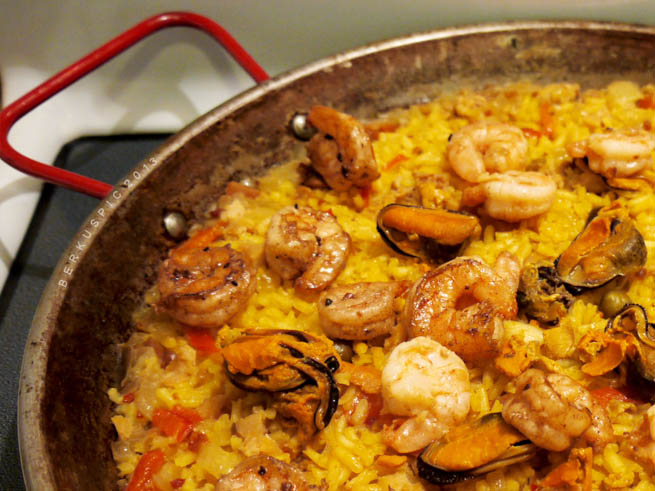 Paella is a Valencian rice dish with ancient roots that originated in its modern form in the mid-nineteenth century near Albufera lagoon, a coastal lagoon in Valencia, on the east coast of Spain 