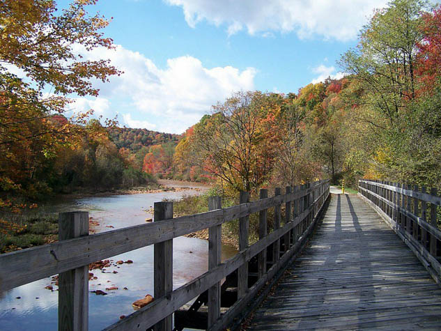 Get fit on your next trip by visiting one of these amazing rails to trails destinations.